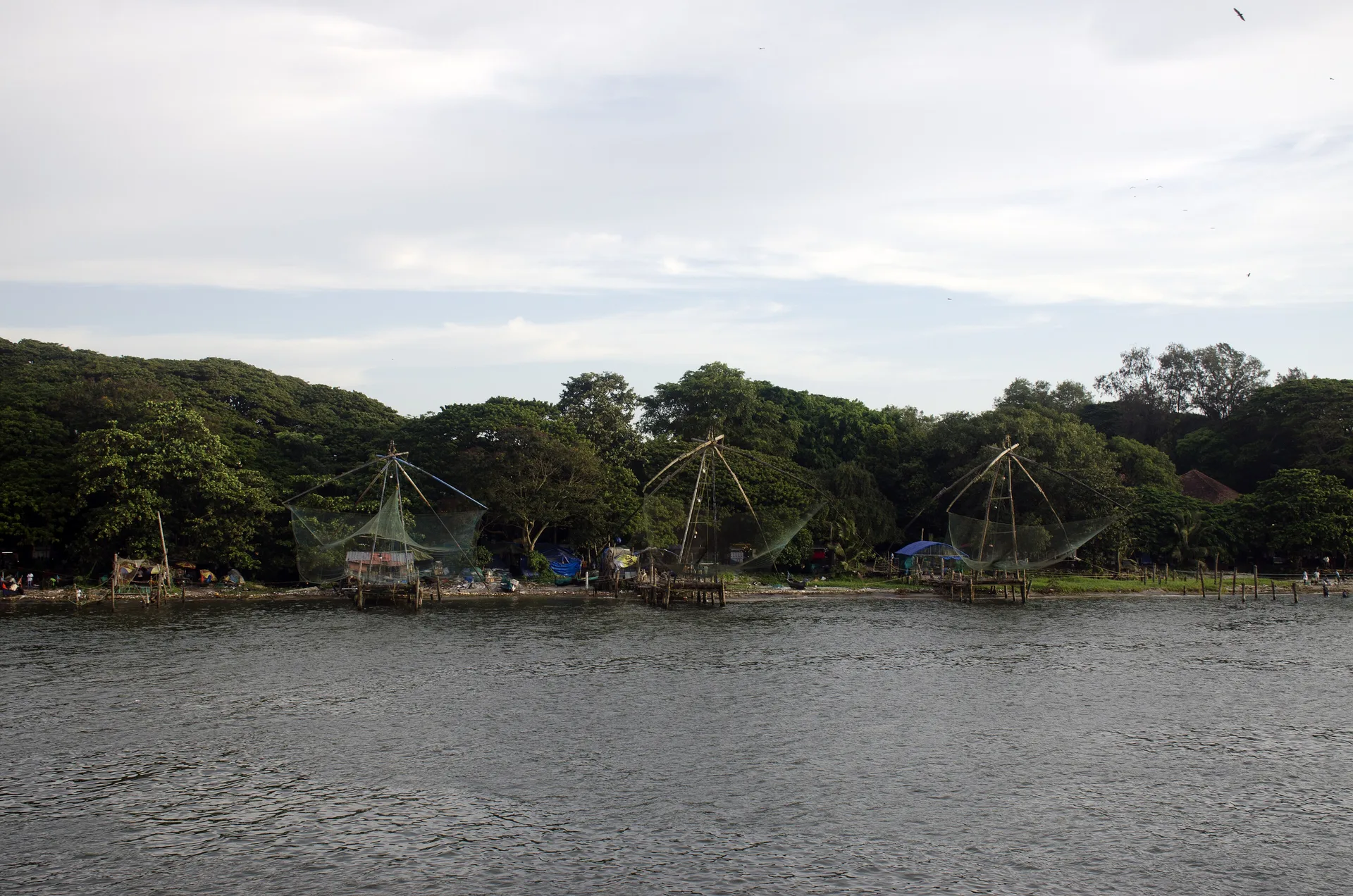 Chinese fishing nets along the Fort Kochi waterfront, the coastal base for self-drive car rental in Cochin