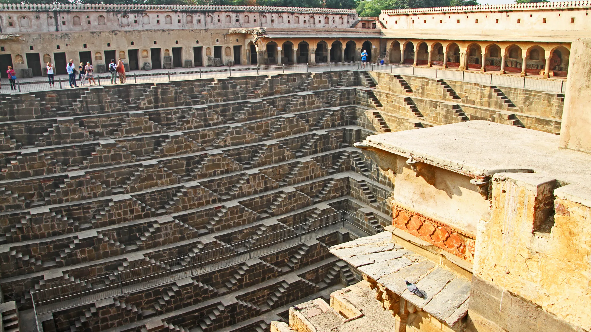 Close geometric pattern of Chand Baori steps in morning light, Abhaneri, a stop on a self-drive car rental in Jaipur outing