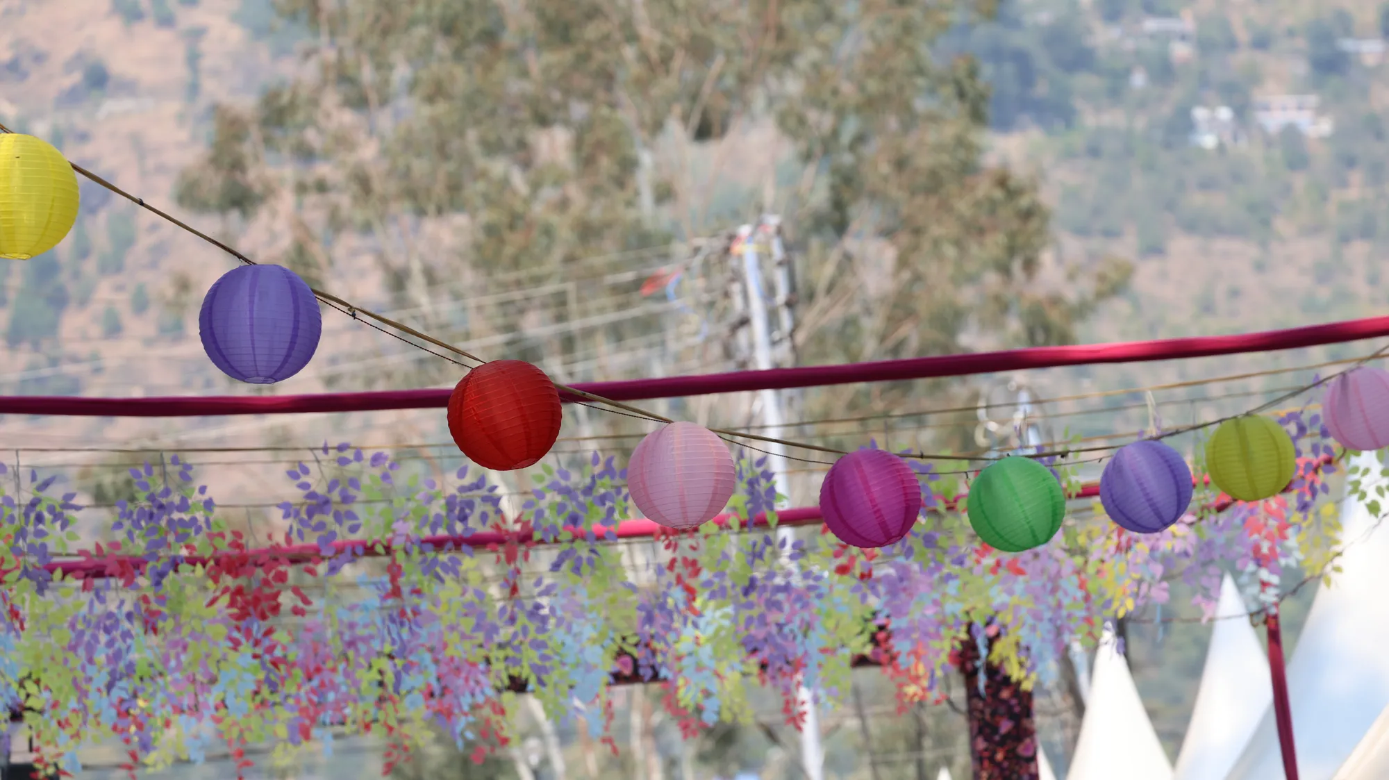 Coloured paper lanterns strung over the fairground at Kullu Dussehra in Himachal Pradesh