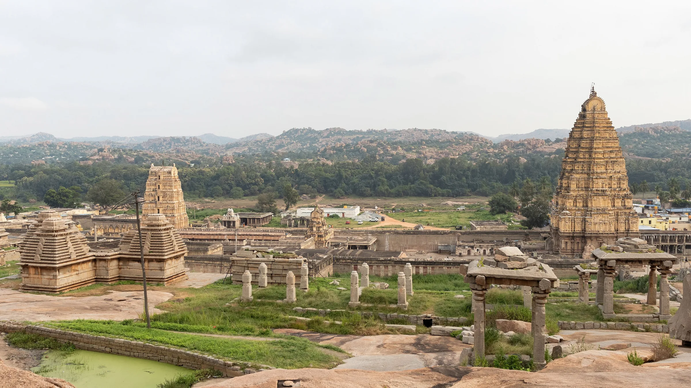 Wide view of the Virupaksha Temple complex and boulder hills at Hampi, Karnataka