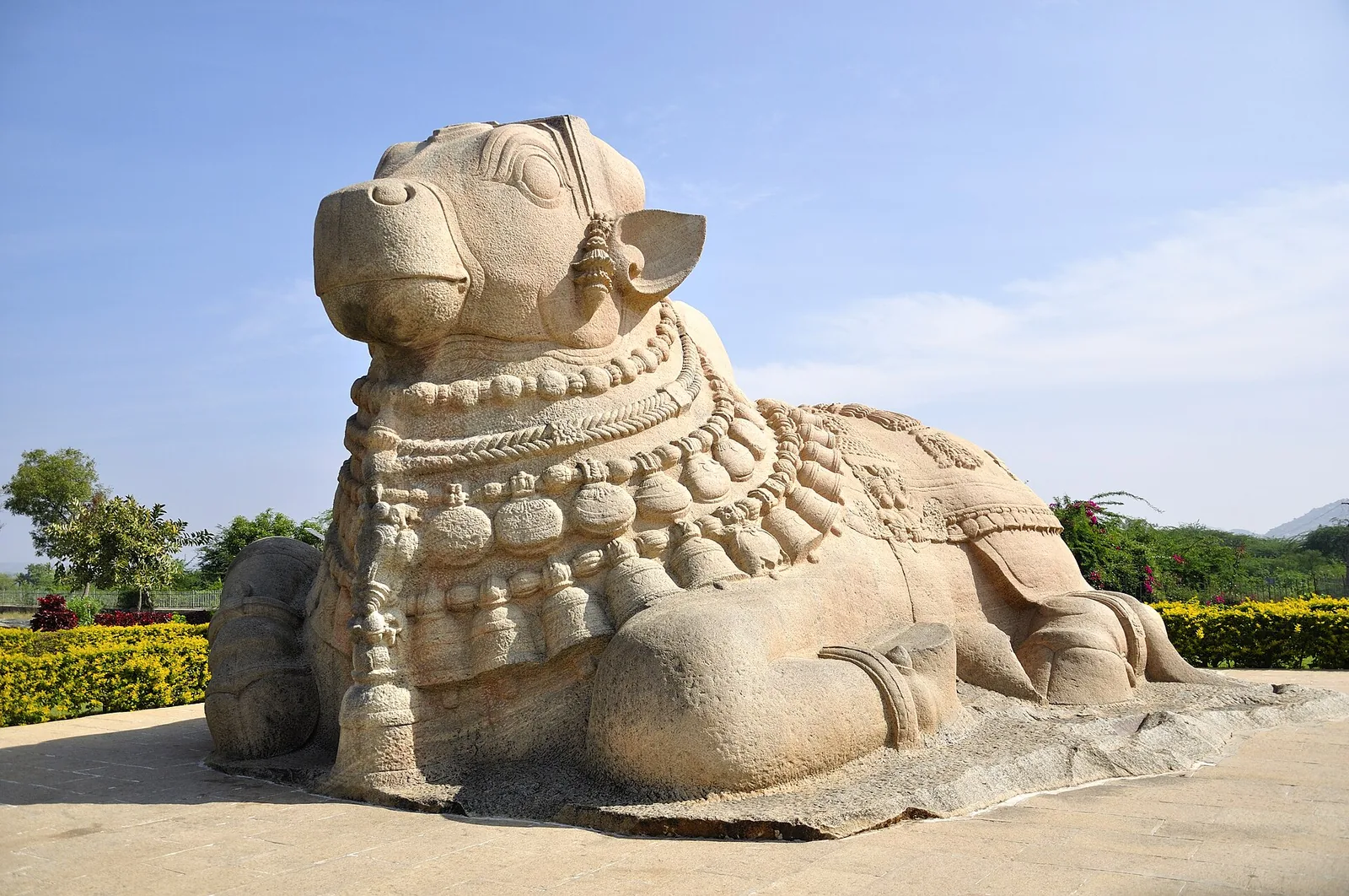 Monolithic granite Nandi bull at Lepakshi near Veerabhadra Temple, a landmark on a self-drive car rental in Bangalore outing