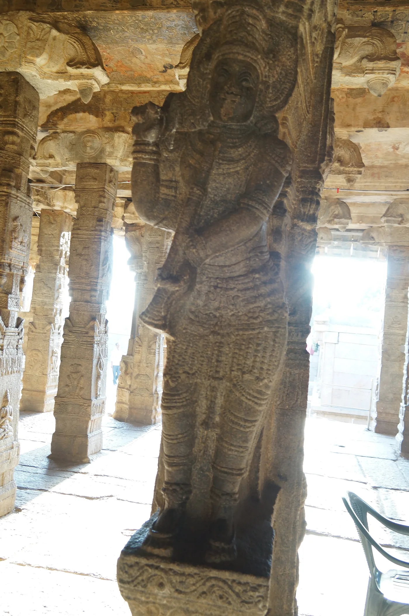 Carved dancer figure on a granite pillar inside Veerabhadra Temple Lepakshi, Andhra Pradesh, on a Bangalore self-drive car day