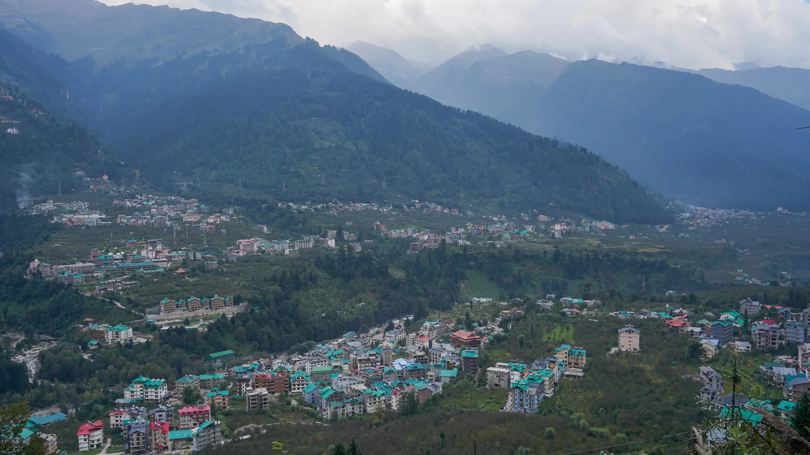 The Beas valley at Manali in early October, with Simsa village and apple orchards below forested mountains
